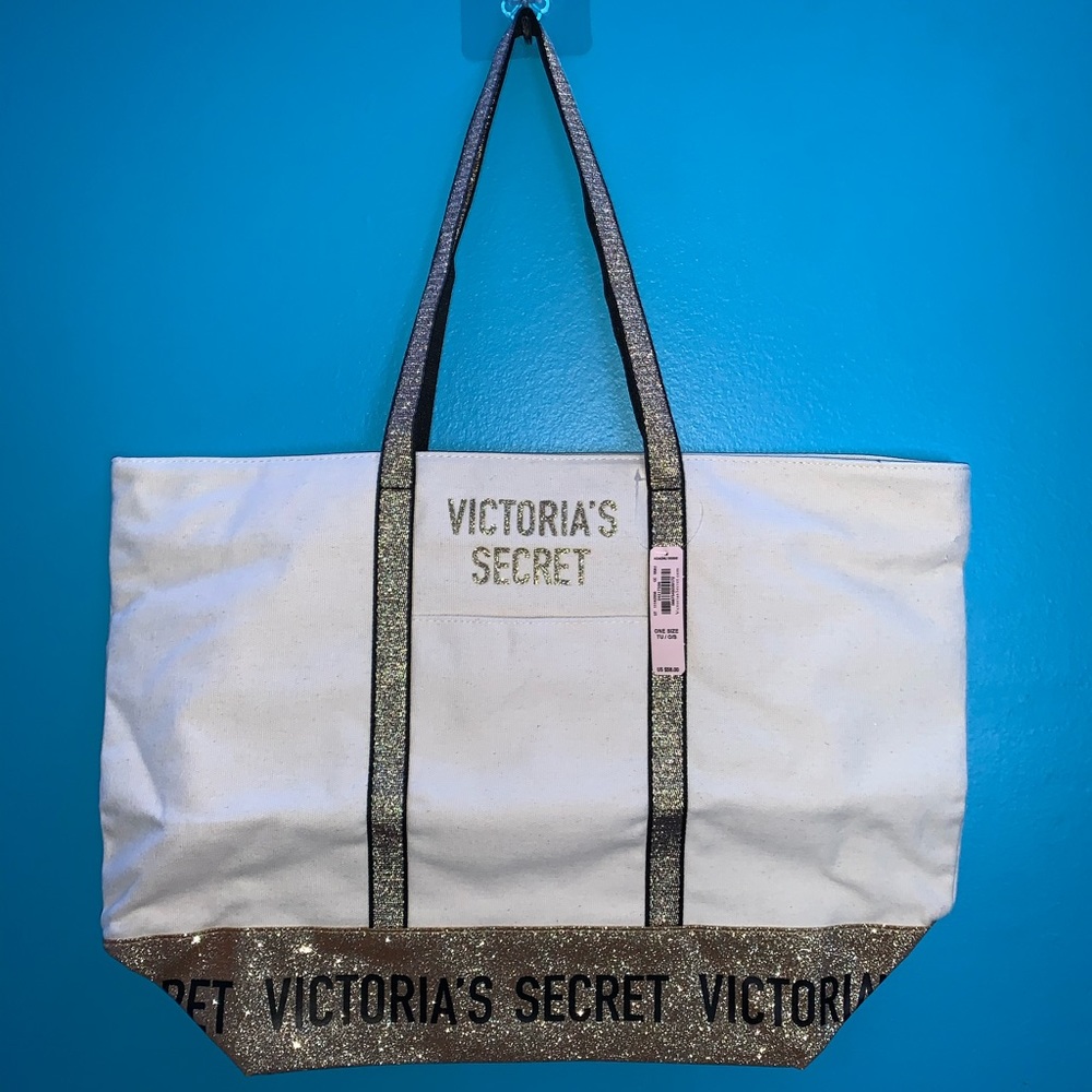 Victoria’s Secret tote with gold sparkles